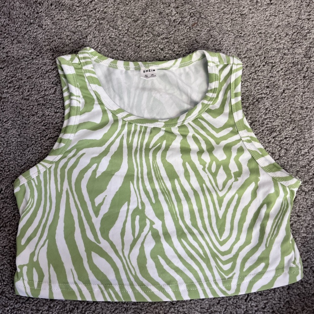 Green going out top size xs zebra print green and white